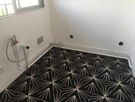 Carreaux de ciment hexagonal Stellaire Noir au sol